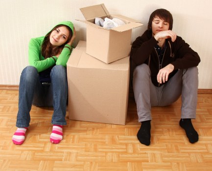 Careful wrapping and transport of large furniture during a removal job