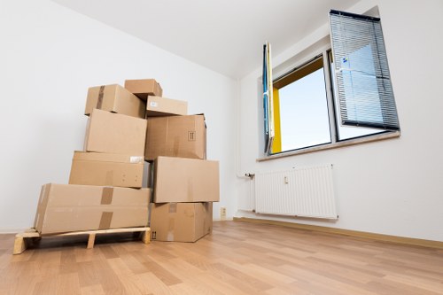 Packed boxes and furniture prepared for a local house move