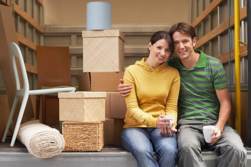 Loading household items into a van for a local move