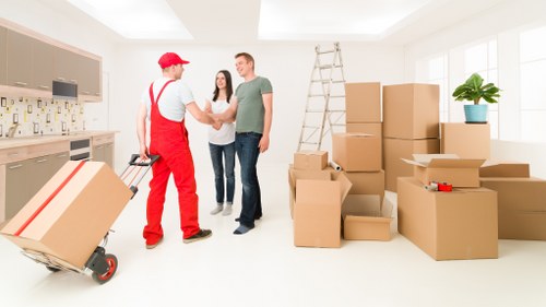 Packed office furniture and equipment ready for relocation