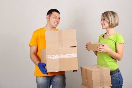 Removal team loading boxes for a student move near Wandsworth
