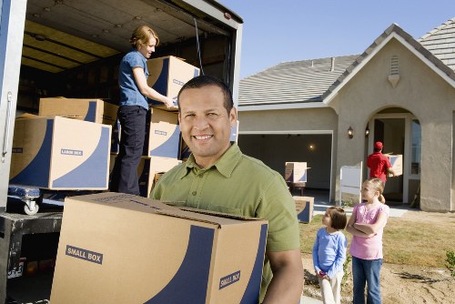 Packing and loading furniture into a moving truck in Wandsworth
